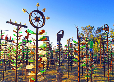A collection of bottle trees.